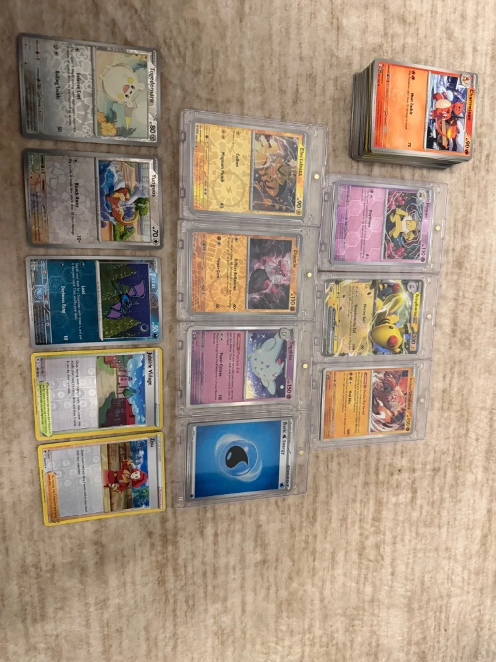 Bundle of 100 Pokemon cards - 12 Holographic Cards, 7 with PSA Looking Case Incl